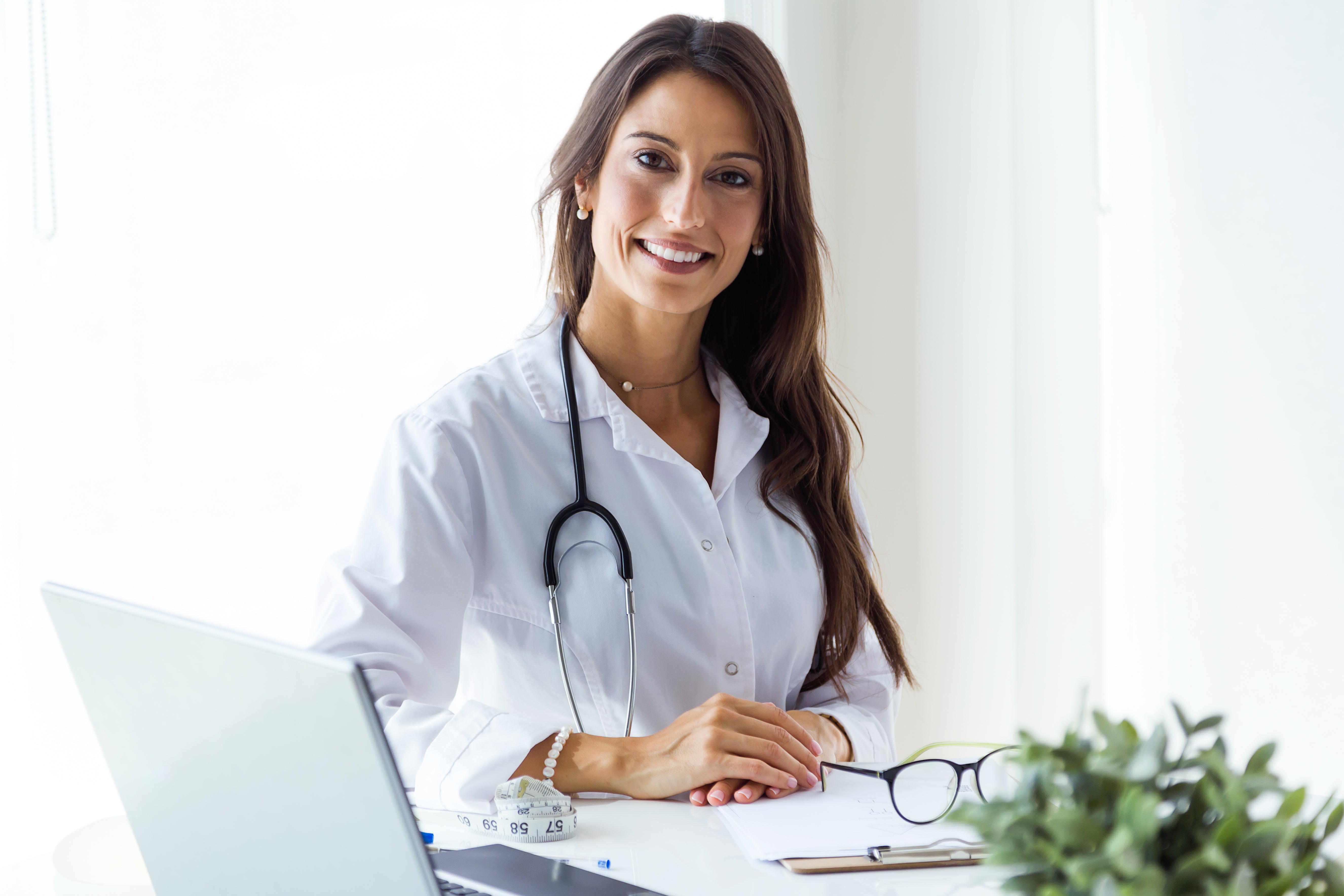 files/beautiful-young-female-doctor-looking-camera-office.jpg